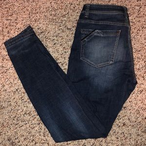 Buckle black skinny jeans